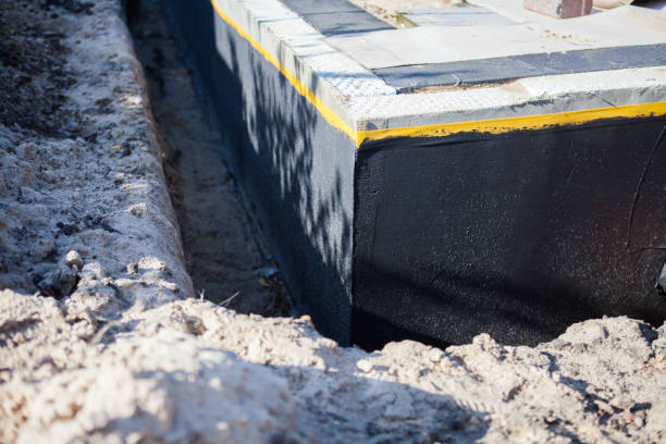 Professional Emergency Waterproofing technician working in LaFayette, GA